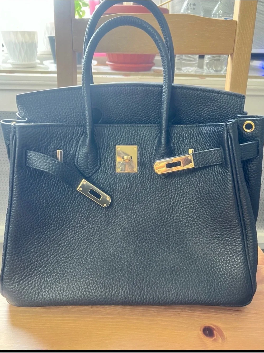 Black Leather Satchel Handbag with Gold Hardware